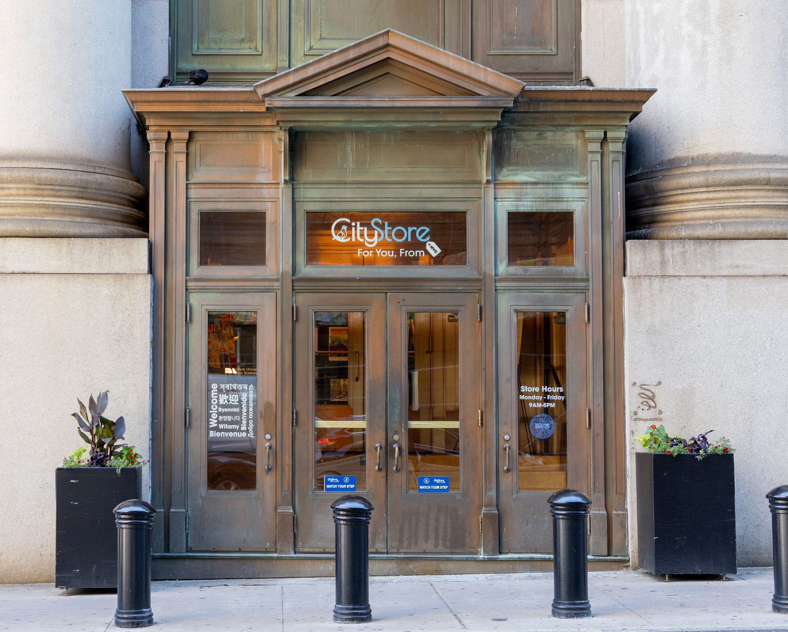 The CityStore entrance on the north side of the David N. Dinkins Municipal Building, marked with the Centre 360 plaza signage.